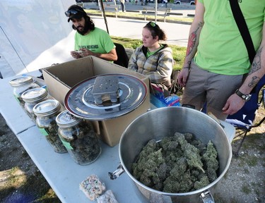 Vendors prepare their stands for the annual 420 event at Sunset Beach in Vancouver, BC., April 20, 2016.