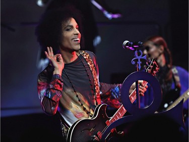 Prince performs onstage with 3RDEYEGIRL during their "HITnRUN" tour at Sony Centre For The Performing Arts on May 19, 2015 in Toronto, Canada.
