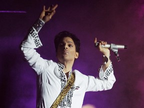 In this April 26, 2008  file photo, Prince performs during the second day of the Coachella Valley Music and Arts Festival in Indio, Calif.