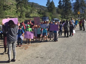 Protest Wednesday near Lytton of trucks carrying food scraps from Metro Vancouver being dumped in a commercial compost operation at Revolution Ranch. [PNG Merlin Archive]