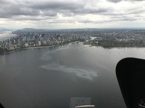 The Coast Guard is on the scene of an oil spill in English Bay April 15, 2016.