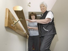 Pat Carney in rehab after both hips were replaced in 2006. They are contributing to her reduced mobility.