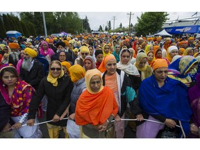 The difference between the words "genocide" and "pogrom' matters a great deal to South Asians and many others. Photo: The annual Vaisakhi parade in Surrey, BC, attracts an estimated 200,000 Sikhs and Hindus each year.