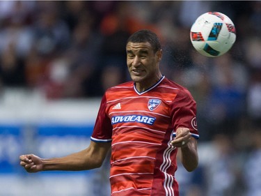 FC Dallas' Tesho Akindele heads the ball during the first half of an MLS soccer game against the Vancouver Whitecaps in Vancouver, B.C., on April 23, 2016.