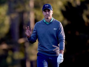 AUGUSTA, GEORGIA - APRIL 09:  Jordan Spieth of the United States reacts on the 18th green during the third round of the 2016 Masters Tournament at Augusta National Golf Club on April 9, 2016 in Augusta, Georgia.