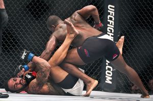 Light Heavyweight Rafael Cavalcante takes another hard punch to the face from Ovince Saint Preux during their UFC Fight Night 82 match. 