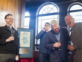 Spirit of the West's Geoffrey Kelly (2nd from right) and John Mann (right) share a laugh with Live Nation's Jason Grant at the unveiling of a commemorative plaque at the Commodore