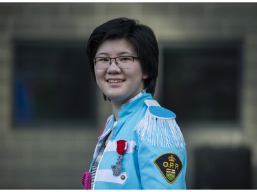 Natasha Kuan wears a coat modelled after the St Peppers cover prior to attending the Paul McCartney concert at Rogers Arena, Vancouver April 19 2016.