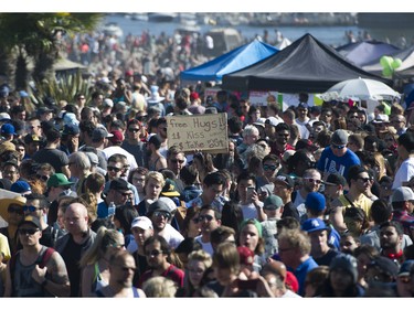 People attend the annual 4:20 marijuana event at it's new location at Sunset Beach, Vancouver April 20 2016.