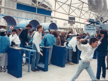 Customers pour through the gates at Expo 86 in this May, 1986 photo.
