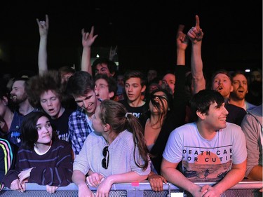 Eagles of Death Metal fans cheer at the P.N.E. Forum in Vancouver on April 26, 2016.