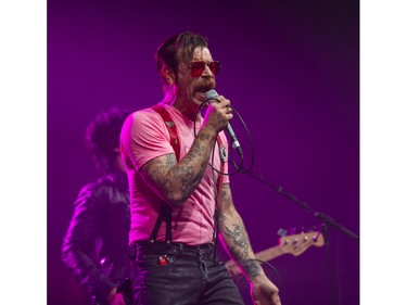 Eagles of Death Metal: Jesse Hughes, lead singer of the band thrills fans at the P.N.E. Forum in Vancouver on April 26, 2016.