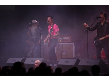 Eagles of Death Metal: Jesse Hughes, lead singer (centre) of the band thrills fans at the P.N.E. Forum in Vancouver on April 26, 2016.