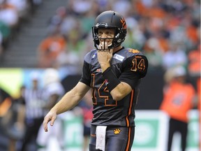 Quarterback Travis Lulay in the special-occasion black/grey jersey and helmet combination that was debuted in 2013. Players liked it, but some fans and most broadcasters, less so.