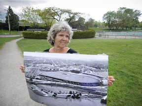 Mary Tasker, a longtime caretaker in New Brighton Park, holds a map of the area from the 1960s.