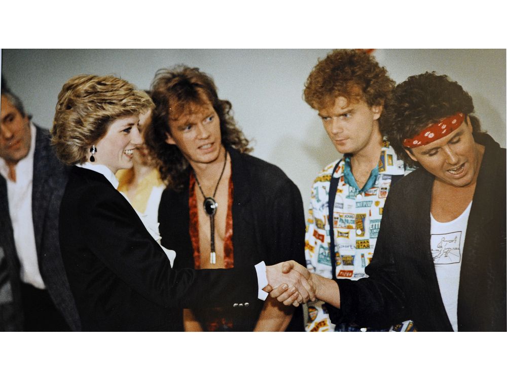 Princess Dianna meets with member of the Vancouver Band "Loverboy" backstage at the Expo theatre in Vancouver during Royal tour of May 1986 