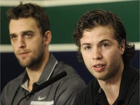 Rookie blue-liner Ben Hutton (right) and veteran centre Brandon Sutter talk to reporters as the Vancouver Canucks wrap up their season at Rogers Arena on Monday.