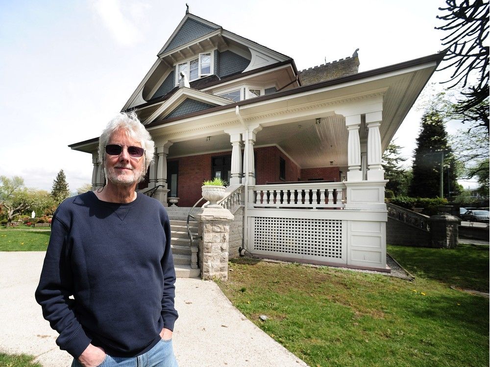 Historian and author Michael Kluckner stands in front of the Wilga, now a rectory for the St. Francis Assisi parish priest.