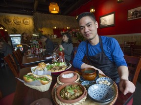 Hong Duong — a.k.a. Mr. Red — with popular dishes at the Kitsilano restaurant.