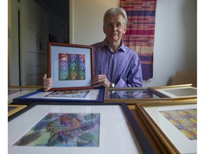 Mark Haden, adjunct professor at the UBC School of Population and Public Health and the chairman of MAPS Canada, with a collection of blotter art he will be auctioning to raise money for a study on the use of MDMA to treat PTSD.