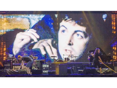 Road crew members prepare the stage prior to Paul McCartney's performance at Rogers Arena in Vancouver, B.C. Tuesday April 19, 2016.
