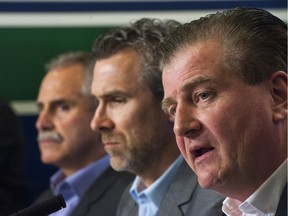 Under head coach Willie Desjardins, president Trevor Linden and general manager Jim Benning (left to right), the Vancouver Canucks have got remarkably younger, faster — and worse on the ice.