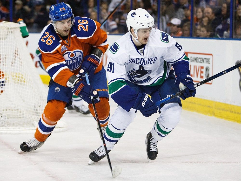 ‘We want something to build on,’ says Canucks rookie centre Jared McCann (right, in action against the Oilers’ Iiro Pakarinen last month) of today’s game in Edmonton. ‘We're not going to mail the season in.’