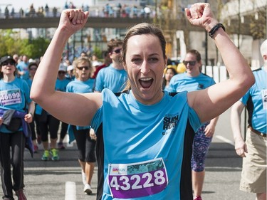 VANCOUVER,BC:APRIL 17, 2016 -- A runner celebrates after crossing the finish line of the 2016 Vancouver Sun Run in Vancouver, BC, April, 17, 2016. (Richard Lam/PNG) (For ) 00042786A [PNG Merlin Archive]