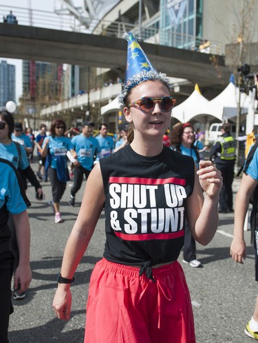 VANCOUVER,BC:APRIL 17, 2016 -- A runner in costume crosses the finish line of 2016 Vancouver Sun Run in Vancouver, BC, April, 17, 2016. (Richard Lam/PNG) (For ) 00042786A [PNG Merlin Archive]