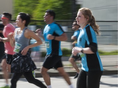 VANCOUVER,BC:APRIL 17, 2016 -- Runners make their way along the course of the 2016 Vancouver Sun Run in Vancouver, BC, April, 17, 2016. (Richard Lam/PNG) (For ) 00042786A [PNG Merlin Archive]