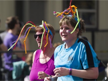 Runners wear buggy headbands while running in the 2016 Vancouver Sun Run.