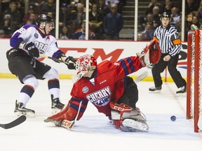 Team Orr's Pierre-Luc Dubois of the Cape Breton Screaming Eagles fires the puck past Team Cherry's goalie Zach Sawchenko (31) of the Moose Jaw Warriors during the CHL/NHL Prospects Game in Vancouver in January. Dubois may be available for the Canucks at No. 5 when they pick in the draft next month.