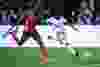 Vancouver Whitecaps’ Kekuta Manneh, right, moves the ball past FC Dallas’ Atiba Harris during the second half.