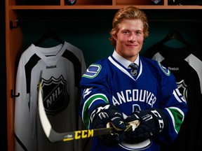 Vancouver Canucks fans will have to remain patient, as it will be at least another season before top prospect Brock Boeser, pictured last June at the NHL Entry Draft, dons a team jersey for real.