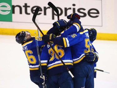 ST LOUIS, MO - MAY 23:  Robby Fabbri #15 of the St. Louis Blues celebrates with teammates after scoring a second period goal against the San Jose Sharks in Game Five of the Western Conference Final during the 2016 NHL Stanley Cup Playoffs at Scottrade Center on May 23, 2016 in St Louis, Missouri.