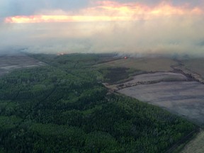 Two blazes have joined as the Beatton Airport Road fire north of Fort St. John shown here.