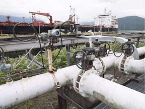 The National Energy Board has recommended that the federal government approve the contentious $6.8-billion Trans Mountain pipeline expansion with 157 conditions.