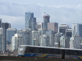 A sky train is pictured in downtown Vancouver.