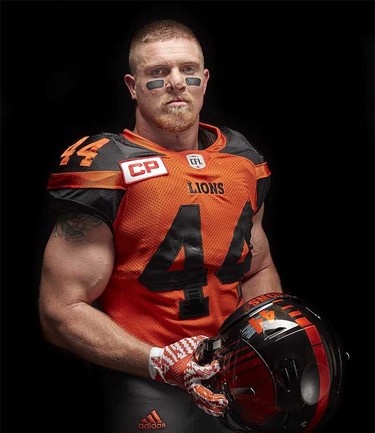 Linebacker Adam Bighill models the B.C. Lions’ new adidas-produced home jersey for the 2016 CFL season, part of a league-wide revamp of team uniforms.
