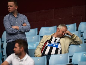 Newcastle fans react after the Barclays Premier League match between Aston Villa and Newcastle United at Villa Park on last week in Birmingham, U.K.