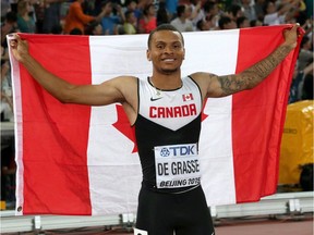 Canada's Andre De Grasse celebrates after winning the bronze medal in the men's 100 metres at the World Athletics Championships at the Bird's Nest stadium in Beijing last August.