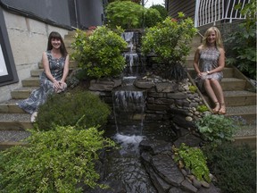 Jennifer Keyes, left, and Teresa Richards with the waterfall that binds them to each other. JASON PAYNE / PNG