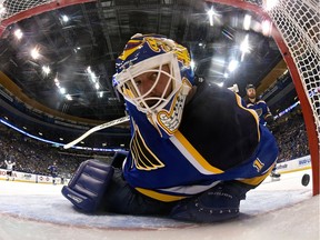 St. Louis Blues goalie Brian Elliott looks back into his net after surrendering one of three goals on the first seven shots fired by the Dallas Stars in Game 6 of their NHL Western Conference semifinal series on Monday at Scottrade Center in St. Louis. The Stars won 3-2 to tie the series 3-3.