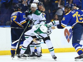 Ryan Reaves (right) of the St. Louis Blues pounds on Curtis McKenzie of the Dallas Stars late in the third period of Game 3 of their NHL Western Conference semifinal series at Scottrade Center in St. Louis on Tuesday. The Blues pounded out a 6-1 win to take a 2-1 series lead.