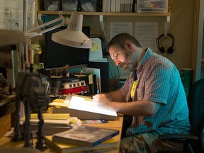 Vancouver cartoonist Doug Savage at work