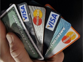 FILE - In this March 5, 2012, file photo, consumer credit cards.