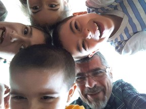 The B.C. mother of four children, who were allegedly abducted and taken to Iran by their father, says her husband has been detained in Iran.