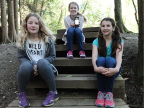 Sixth-graders Saoirse Pontin, Eleni McLaughlin and Madeline Williams (left to right), who created the Hike Safe app.