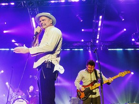 Two Gords in one band now that's Canadian. Gordon Downie (l) and Gord Sinclair (r) of The Tragically Hip performing in 2015.