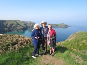 Donna Granik, Julia Hass and Sharon Alison on headland at Mullion Cove